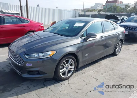 2016 Ford Fusion Energi Titanium z USA, uszkodzony, nr VIN 3FA6P0SU9GR145186